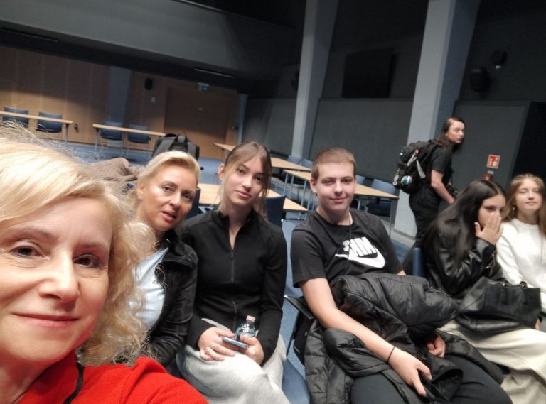 Members of the Greek delegation from RTIS Network and the 4th Lyceum of Alimos sitting in the conference hall of the Marshal's Office in Szczecin, Poland, during an educational visit on Day 4.