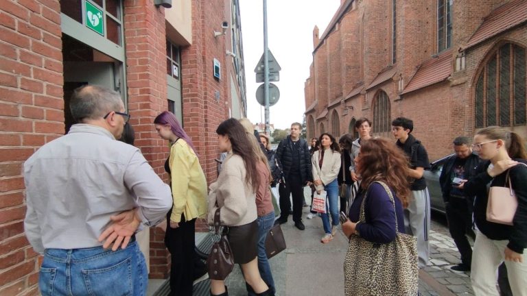 ARTisGReen group standing outside the Archcathedral Basilica of St. James in Szczecin, Poland